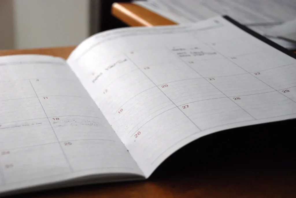 Open monthly planner on a desk