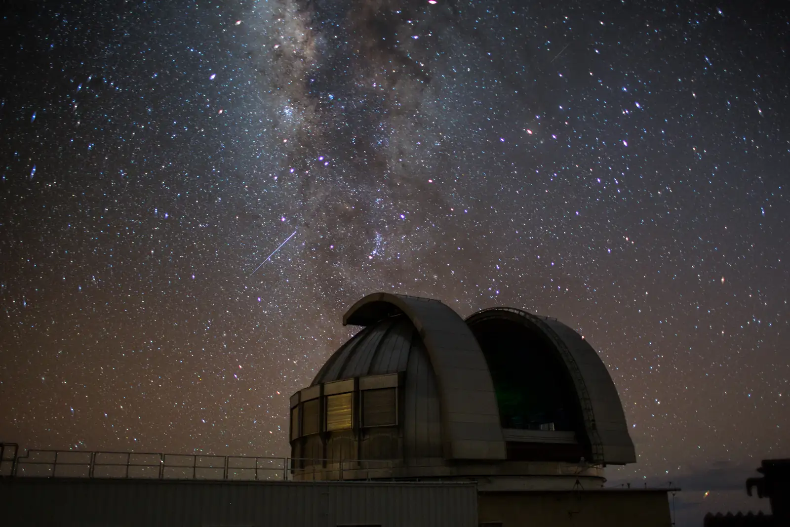 Observatory dome beneath a star-filled night sky