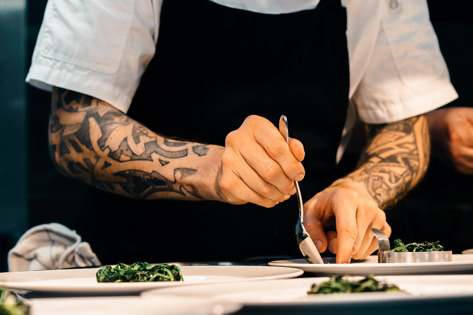 Chef preparing food at a kitchen counter