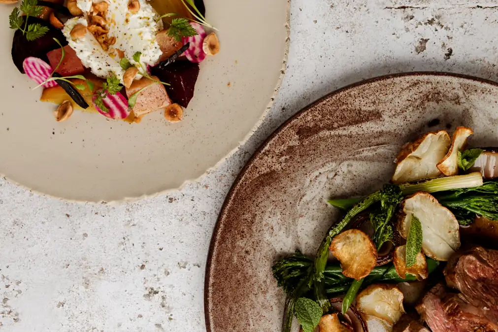 Prepared vegetables served on ceramic plates