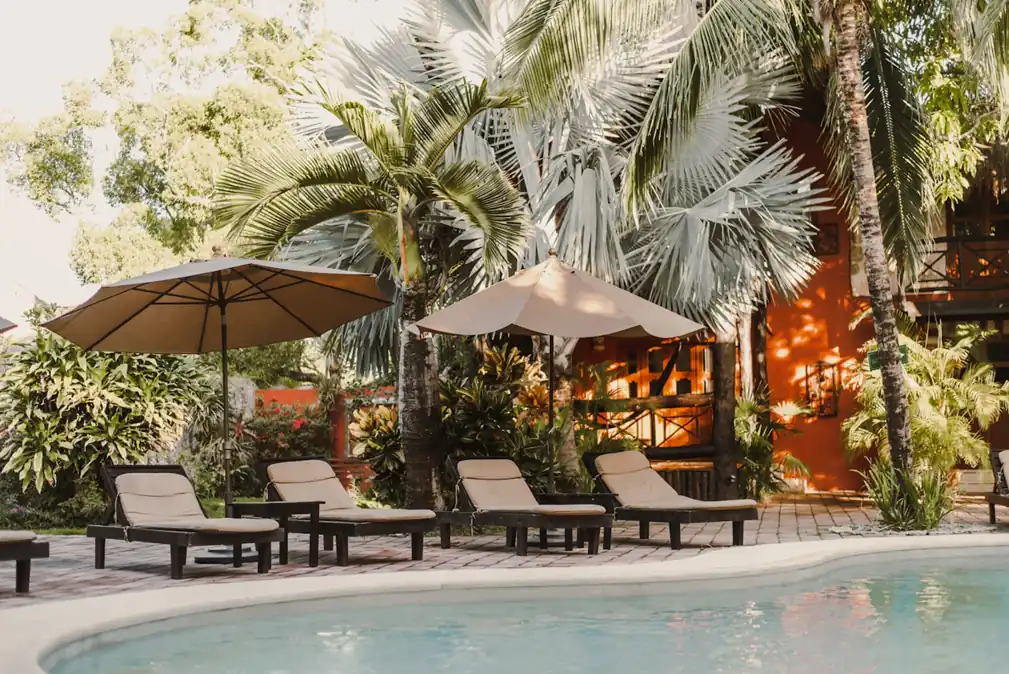 Pool and lounge seating in a hotel courtyard