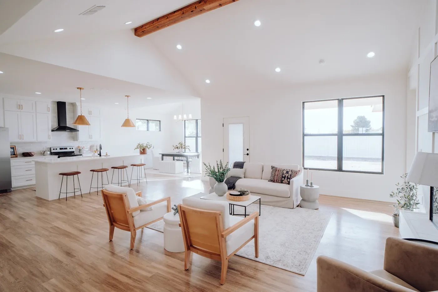 Spare living space with light wood furniture