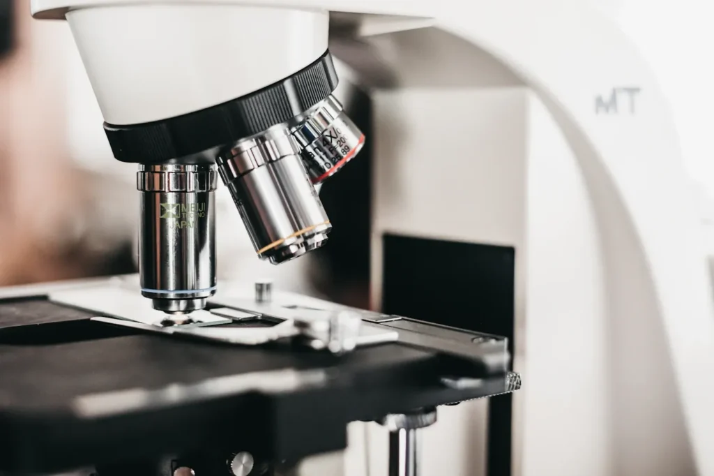 Microscope lenses positioned over a glass slide