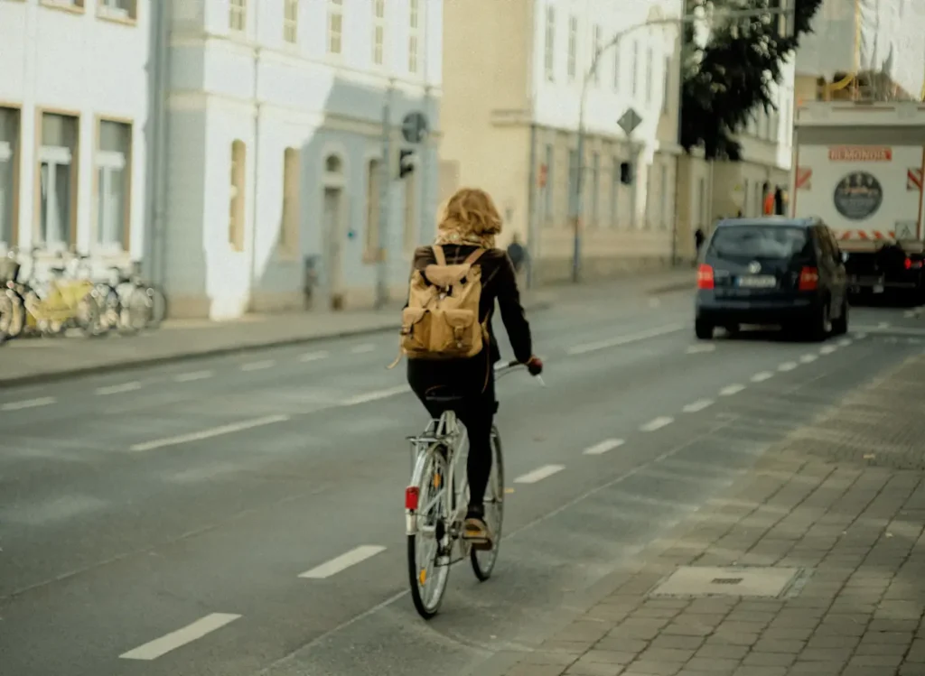 Cyclist travelling along an urban road