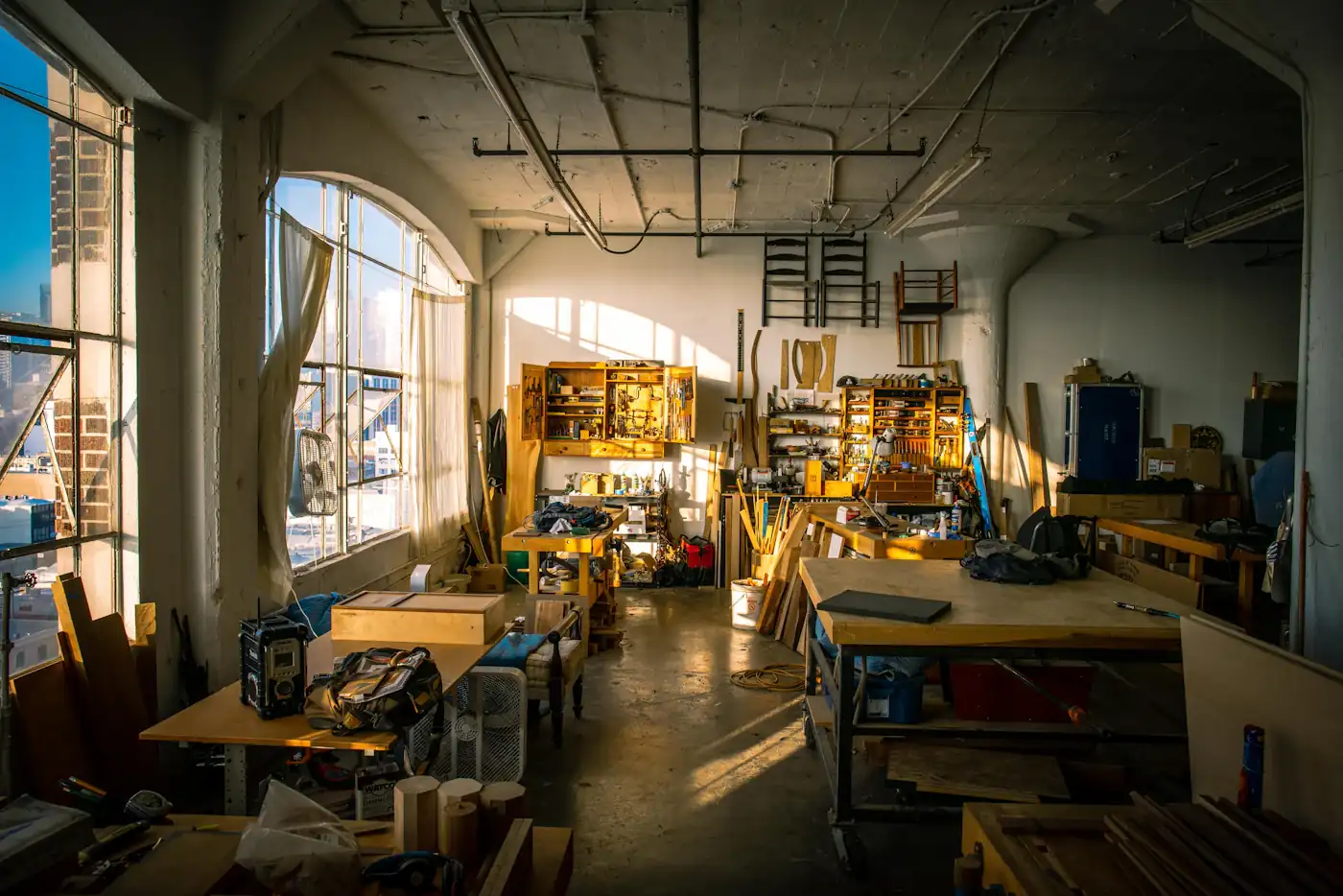 Sunlit workshop with shared worktables